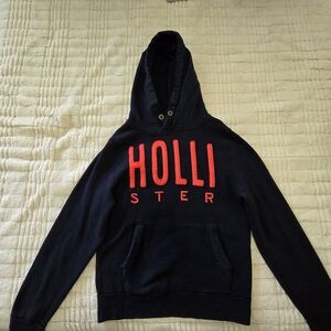 Hollister Men's Navy Hoodie with Red Logo